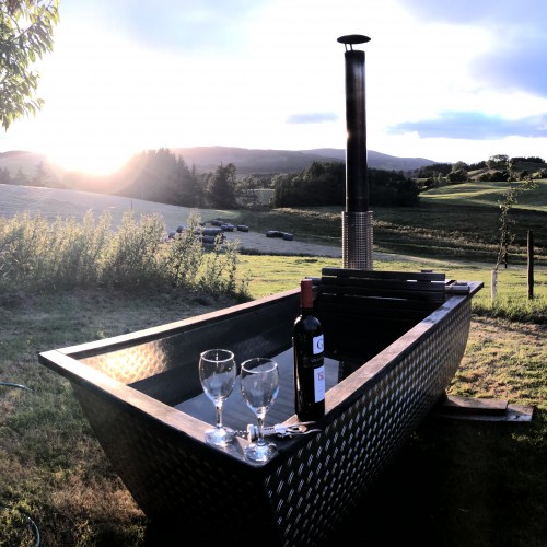 Wood Fired Hot tub (for pods only) Unwind in natural spring water - no chemicalsat Glenshee Glamping